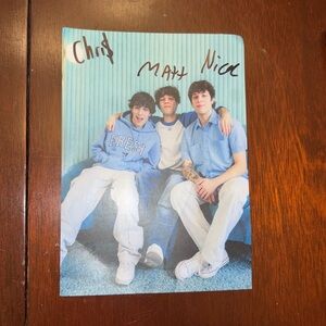Hand signed Sturniolo Triplets photo from Fresh Love clothing drop.